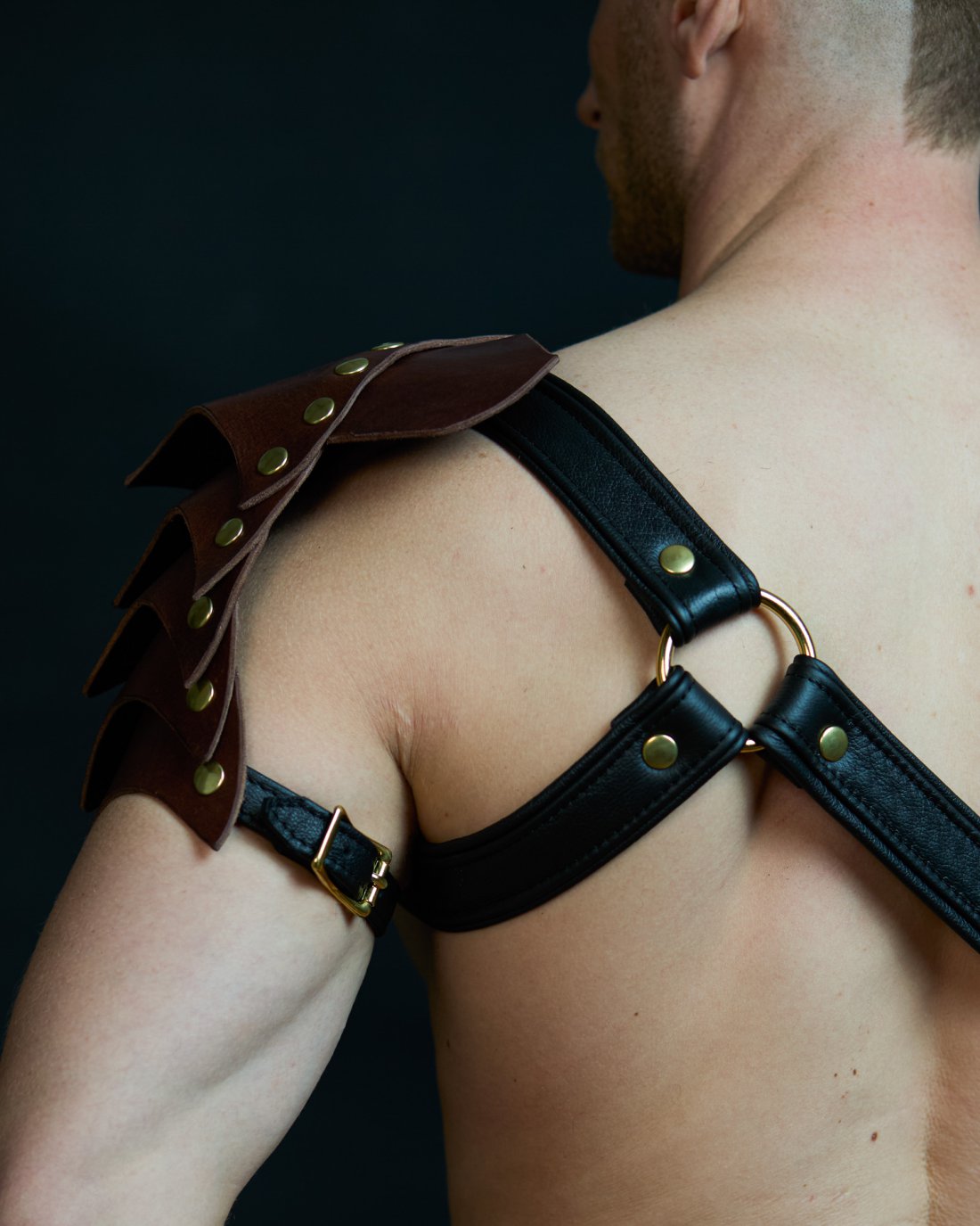 Black leather harness with shoulder armor