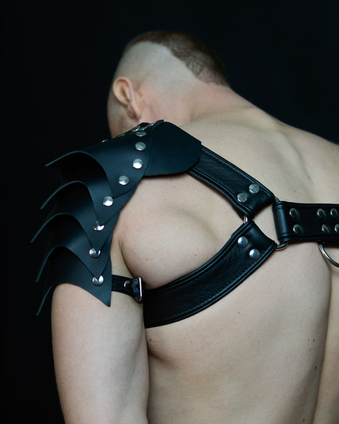 Black leather harness with shoulder armor
