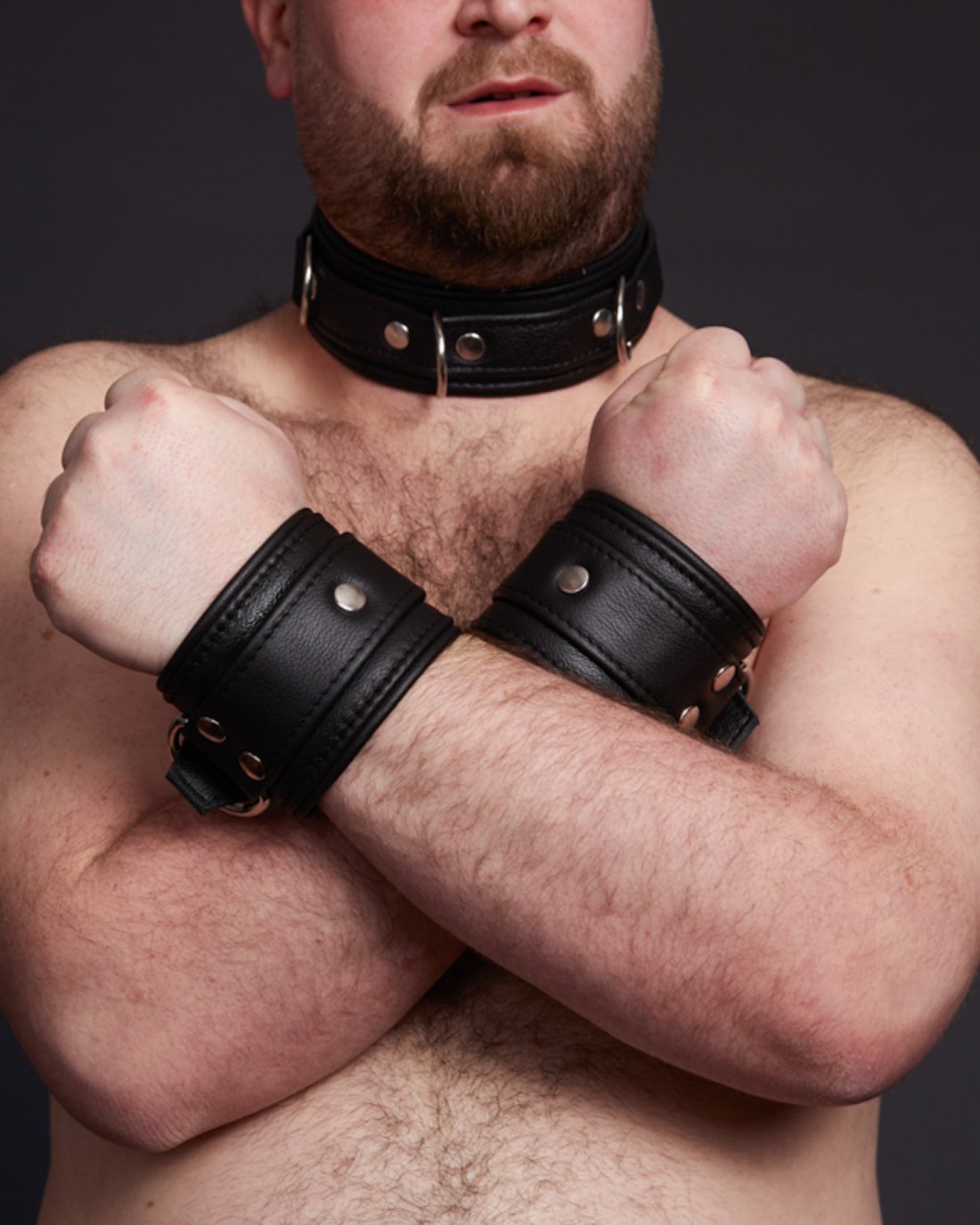 black leather collar and matching leather cuffs