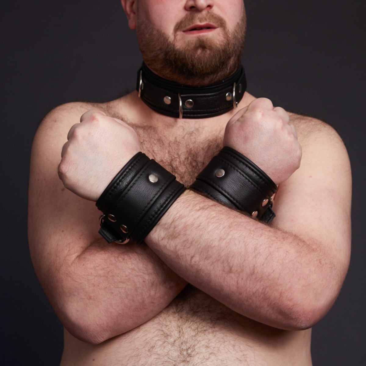 black leather collar and matching leather cuffs